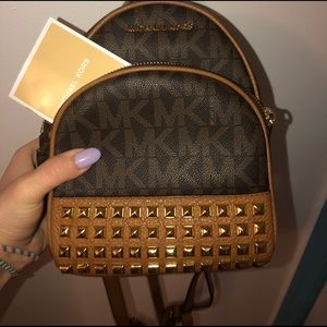 Michael Kors Monogram Studded Mini Backpack